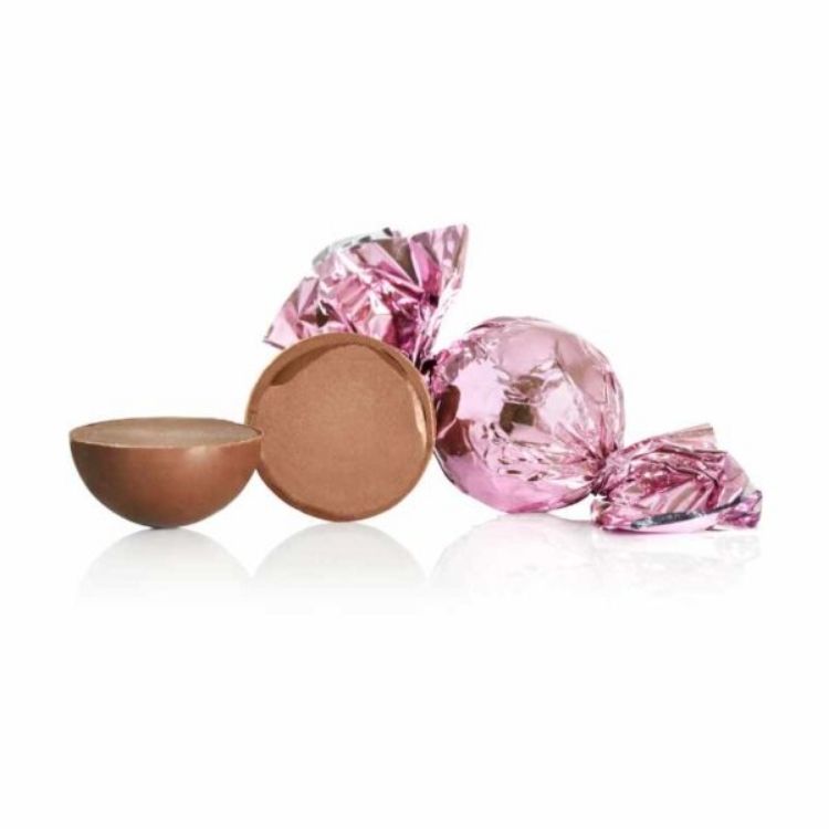 Mælkechokoladekugler med kakaocreme og appelsinsmag.