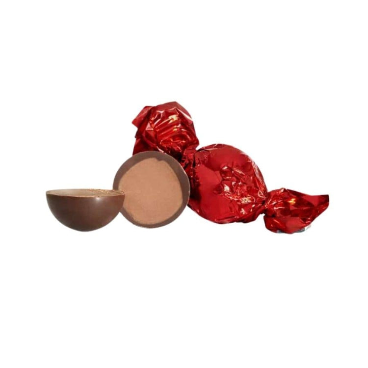 Mælkechokoladekugler med honning og nougatcrisp.